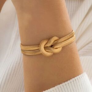 Elegant Gold Knot Bracelet.. Coil Snake Bone Chain Bracelet